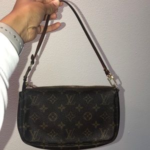 Louis Vuitton clutch with shoulder strap